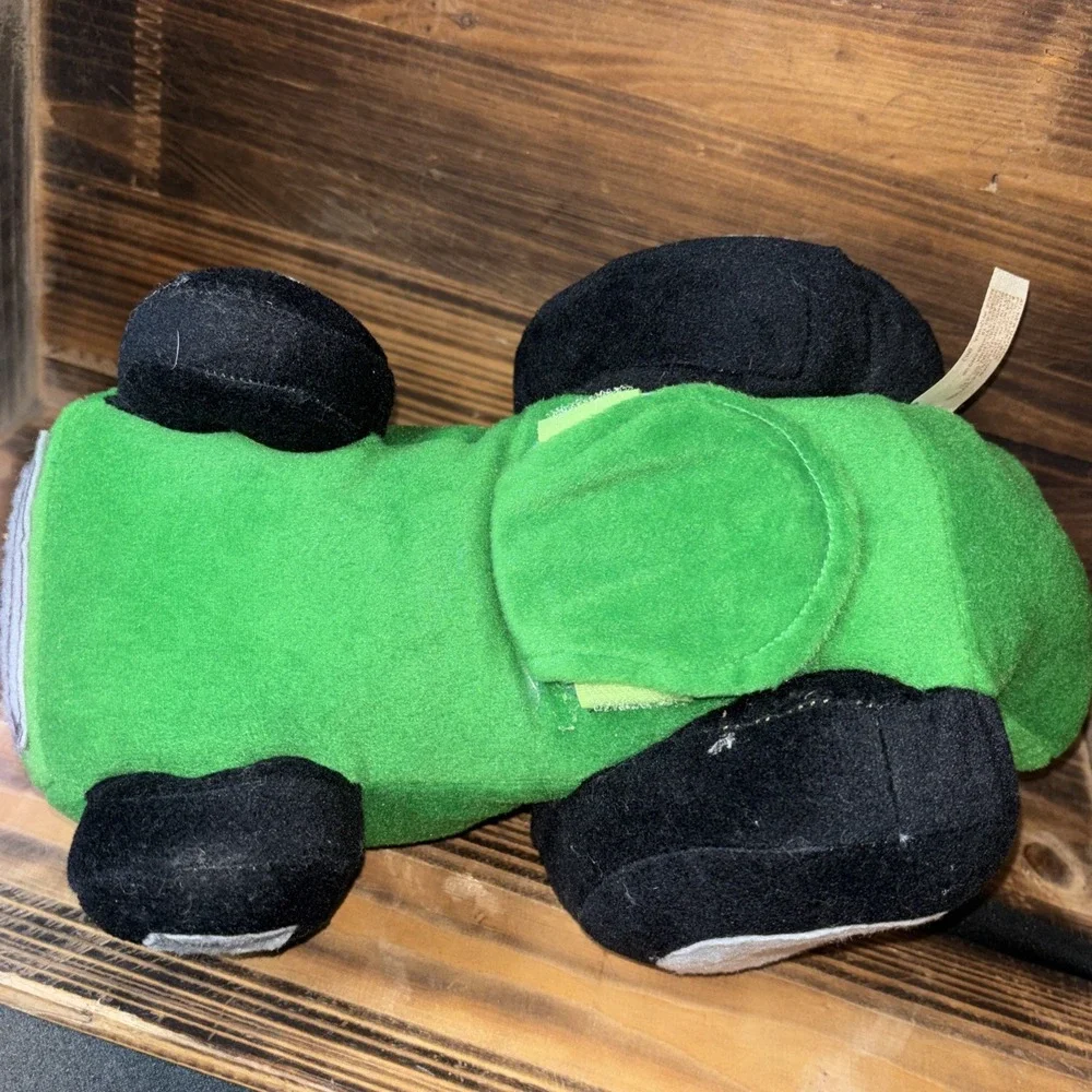 Dan Dee Deer Plush Grandma Got Ran Over Music Reindeer on Green tractor